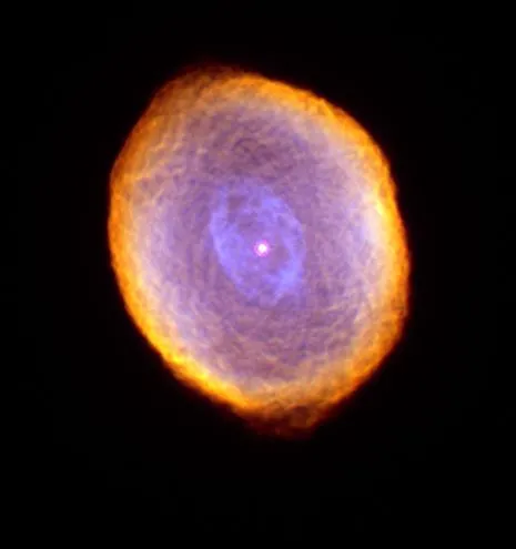 Mgławica planetarna Spirograf (HST)  fot: By NASA and The Hubble Heritage Team (STScI/AURA) 