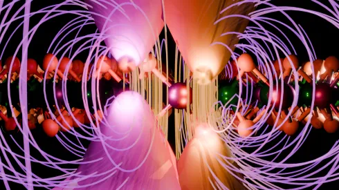 Monowarstwa stopu dichalkogenku metalu przejściowego MoWSe2 wraz z dolinami K+ i K- . Fioletowymi liniami zaznaczono zewnętrzne pole magnetyczne, którego przyłożenie prowadzi do rozszczepienia energii stanów ekscytonowych w wyniku efektu Zeemana. Zjawisko to przedstawiono jako różne odległości pomiędzy pasmem walencyjnym i pasmem przewodnictwa w obu dolinach. (źródło Grzegorz Krasucki Wydział Fizyki UW).