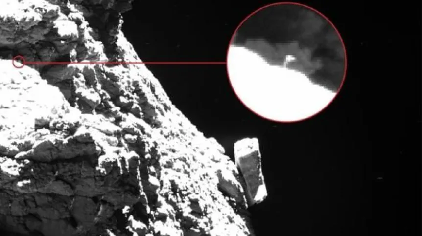 Powierzchnia komety 67P/Churyumov-Gerasimenko. Powiększono fragment, na którym widać jedną z trzech nóg lądownika Philae. Źródło: ESA/Rosetta/MPS for OSIRIS Team MPS/UPD/LAM/IAA/SSO/INTA/UPM/DASP/IDA – CC BY-SA 4.0