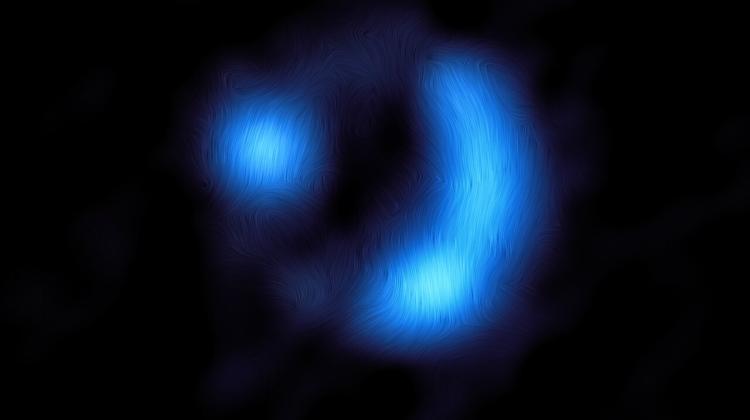 Widok galaktyki 9io9 odległej o 11 miliardów lat świetlnych. Obraz na podstawie obserwacji siecią radioteleskopów ALMA. Źródło: ALMA (ESO/NAOJ/NRAO)/J. Geach et al.